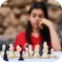 a girl playing chess.